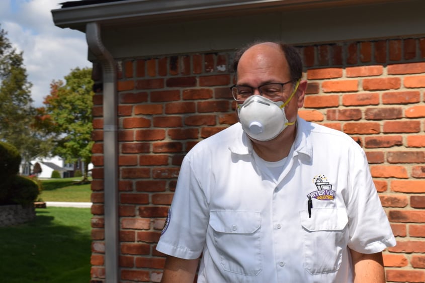 man wearing a Dryer Vent Wizard Uniform